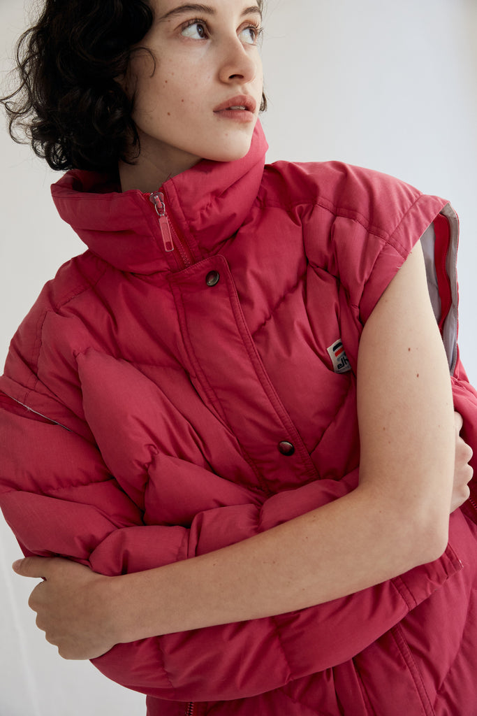 woman in red vintage bomber jacket